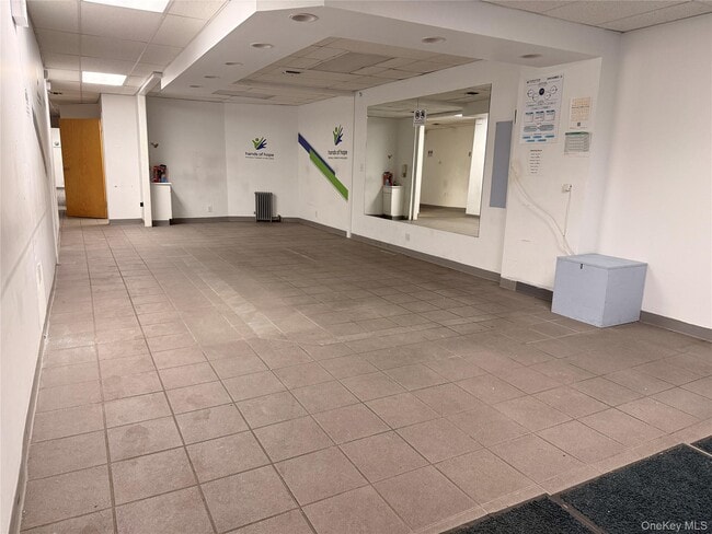 Photo - 86-20 Jamaica Ave Unidad Storefront