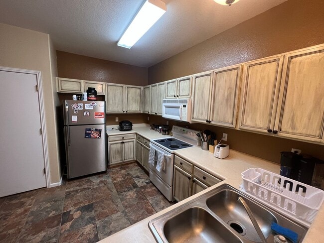 Photo - Beautiful Ridgeview at Stetson Hills Townhome Near Powers Corridor Amenities with a 2 Car Garage!