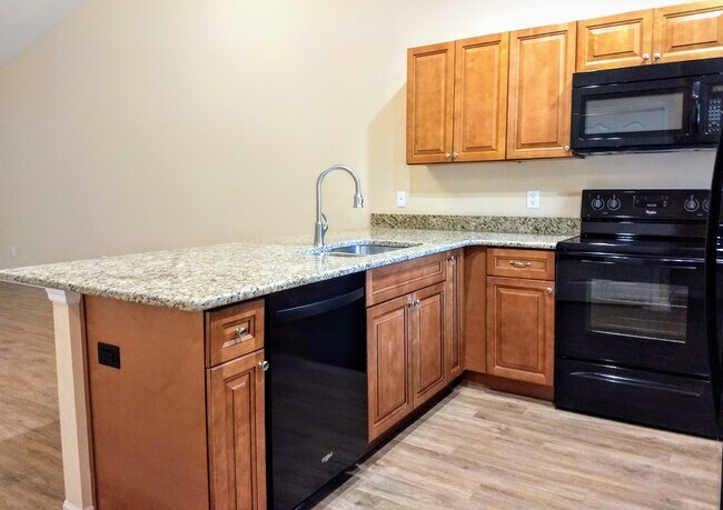 Granite Countertops - 9428 N Travis Dr
