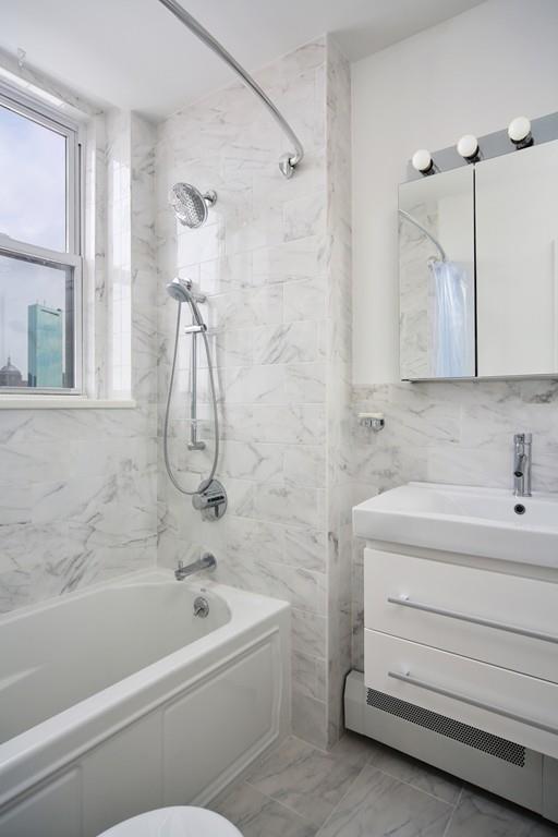 Admire the city from the shower - 483 Beacon St Unit Apt 91