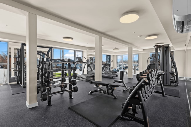 Stay active in a fully equipped fitness center at our Sumner apartments. - Fryar Flats Apartments