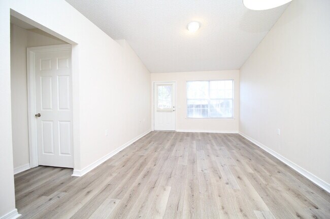 Photo - 2-Bedroom, 1-Bath Attached Home in Nantucket Place – Prime Location with Open Layout, Fenced Back...