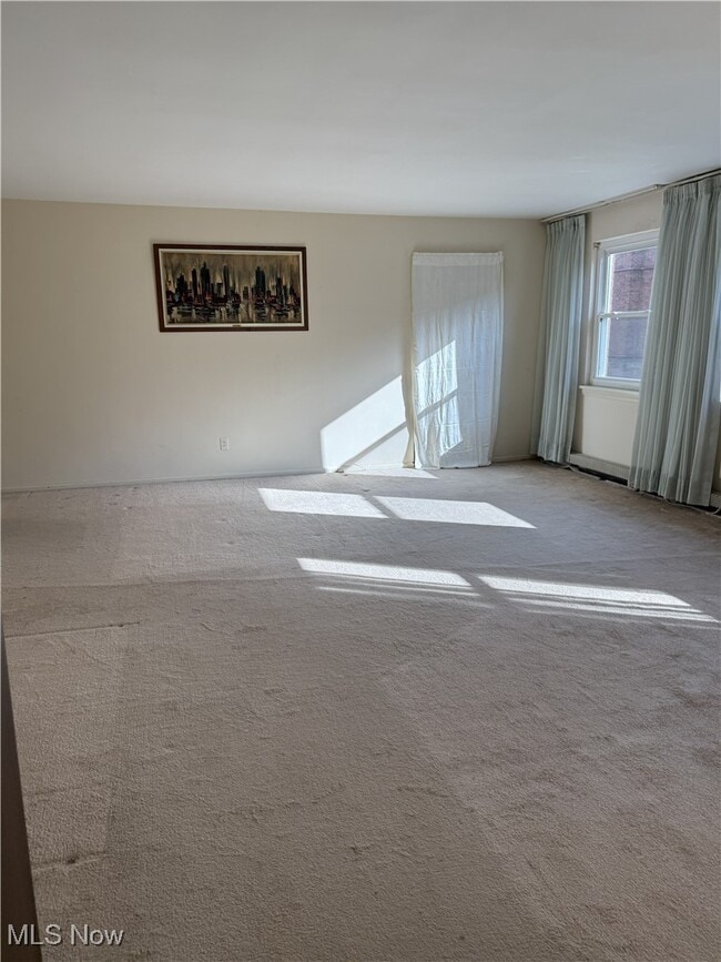 Building Photo - 13781 Cedar Rd Unit 201