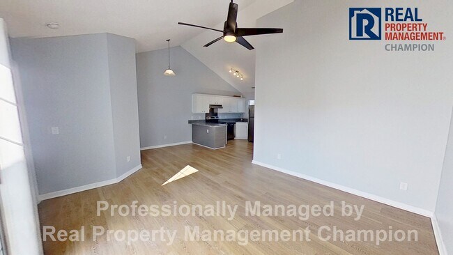 Photo - Immaculate 2 BD/2 BA Townhome with Open Floorplan and Split Bedrooms