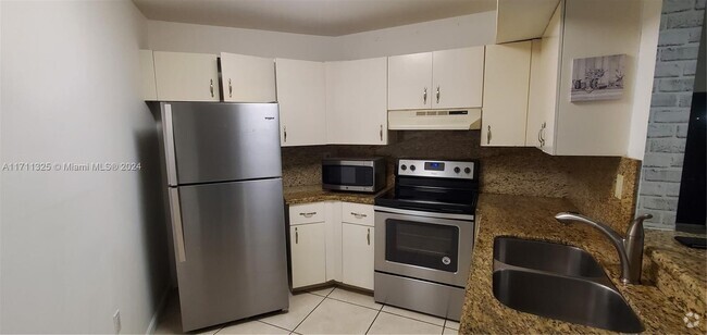 Building Photo - 9715 Fontainebleau Blvd Unit 302 Rental