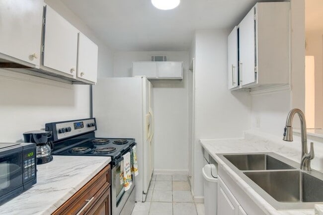 Building Photo - 10100 S Gessner Rd Unit 411