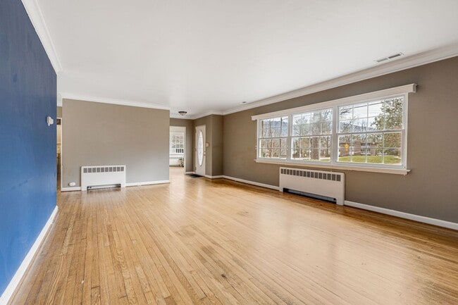 Photo - Bright & Inviting 2-Bedroom Home with Fenced-In Yard, Garage & Lawn Care Included
