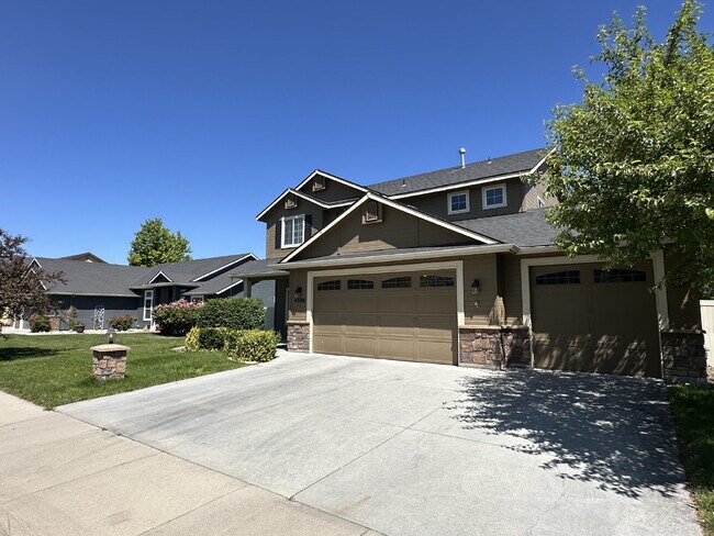 Photo - "Charming 4-Bed Home with Granite Accents & Hardwood Elegance in Meridian!"