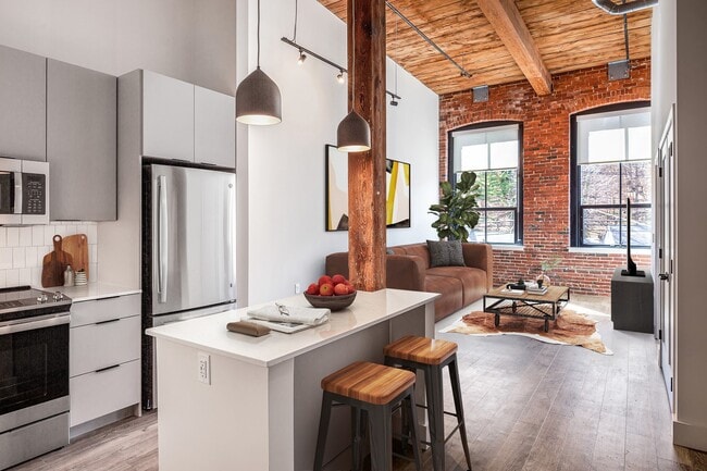 Gourmet chef-inspired kitchens, complete with quartz countertops and a luxury cooking island