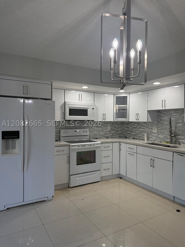 Building Photo - 8650 SW 133rd Avenue Rd Unit 211