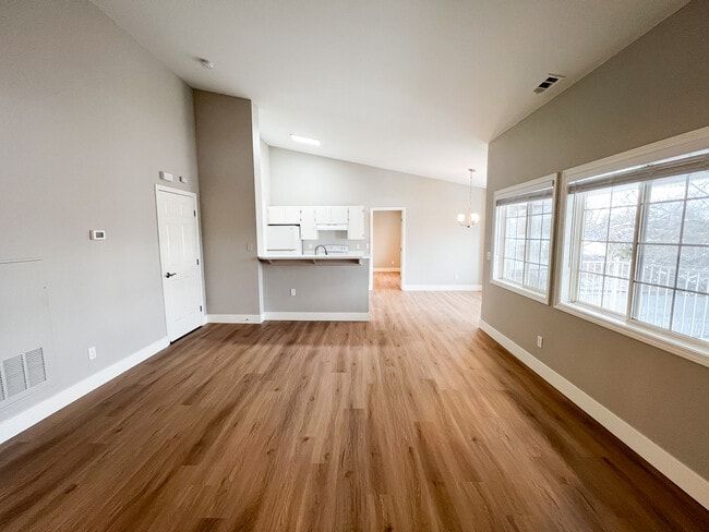 Enter in large living room. - 6521 W Lucky Ln Unit 201