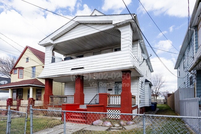 Building Photo - 3131 W 58th St Unit Down