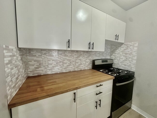 Photo - Open-Concept 3BR Condo with Finished Basement in Canton