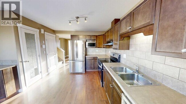 Photo - 11218-11269 69 Ave