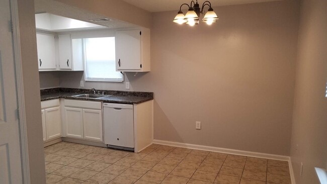 Building Photo - 2223 Joan Ave Unit 105