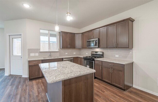 Photo - Move-In Ready 4-Bedroom Home with Ideal Lo...