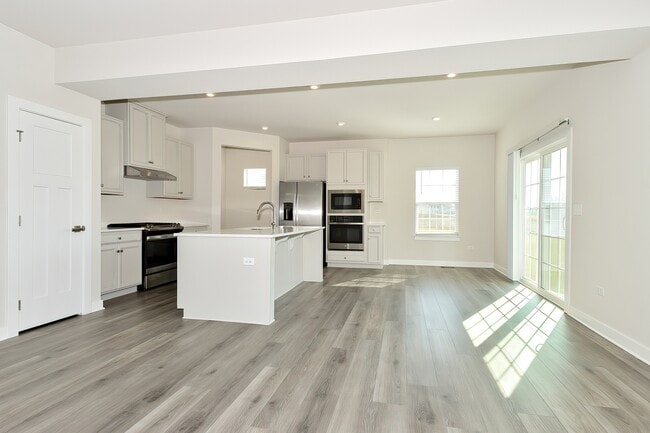 Open-Concept Living and Kitchen Space - Conservancy at Gilberts
