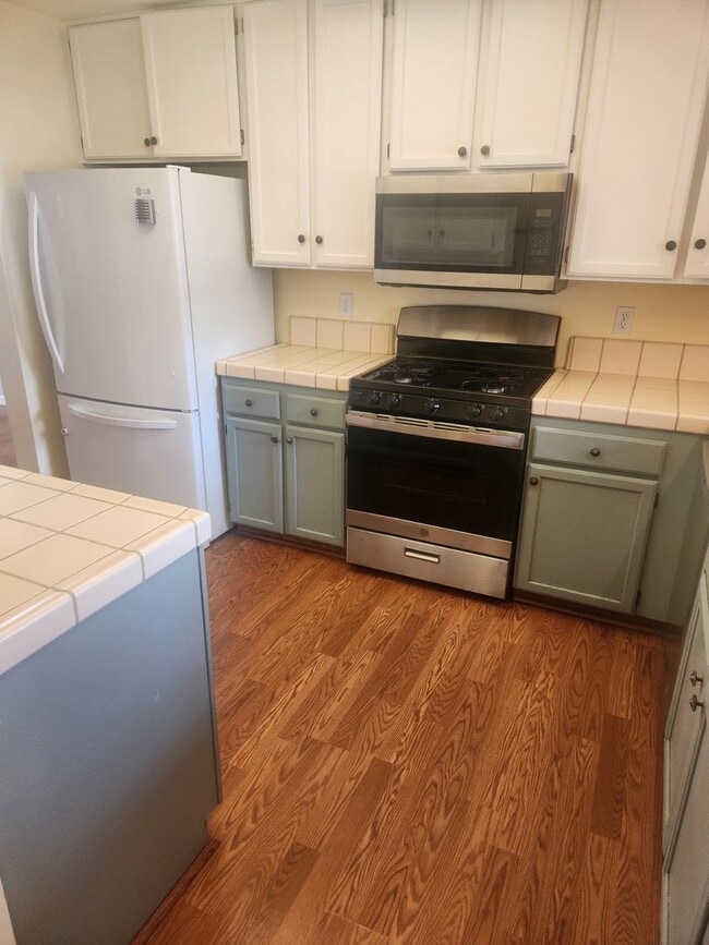 Photo - Beautiful well maintained two story, two bedroom townhouse with private backyard.