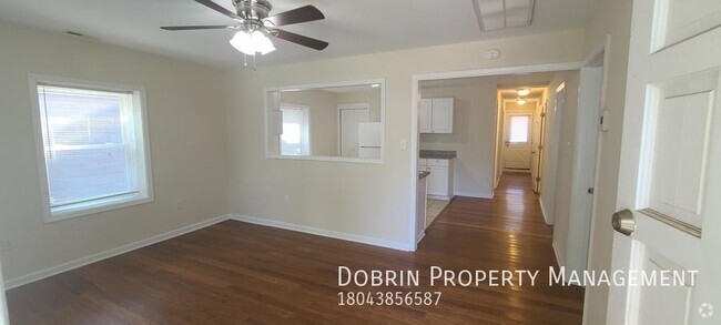 Building Photo - RENOVATED 4BD: Open Floorplan - In The FAN!! Rental