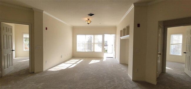 Living room with build in entertainment center. - 3707 Conroy Rd Unit 1722