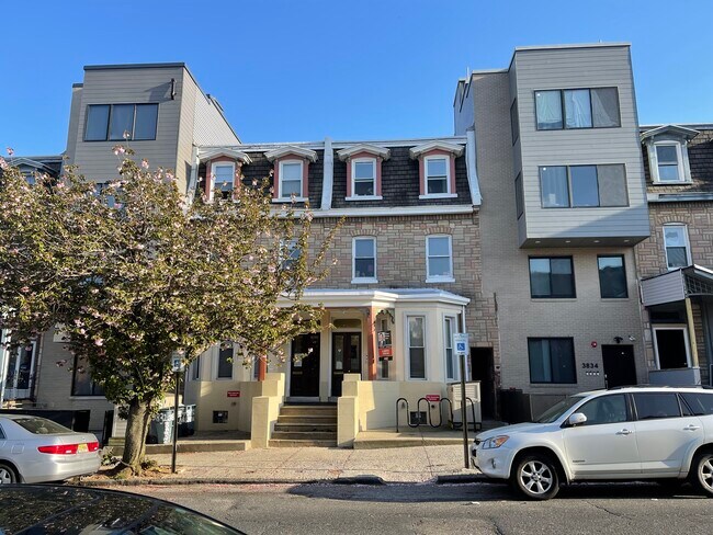 Classic Victorian Details with Mansard Roof.
