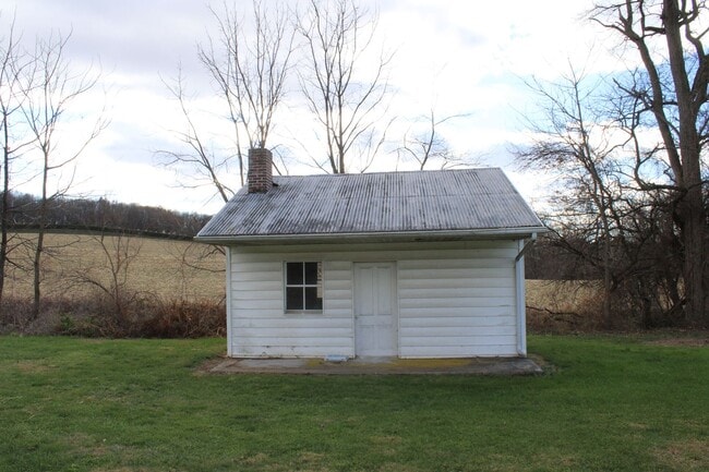 Photo - Country Charm in this 2.5 Story Farmhouse