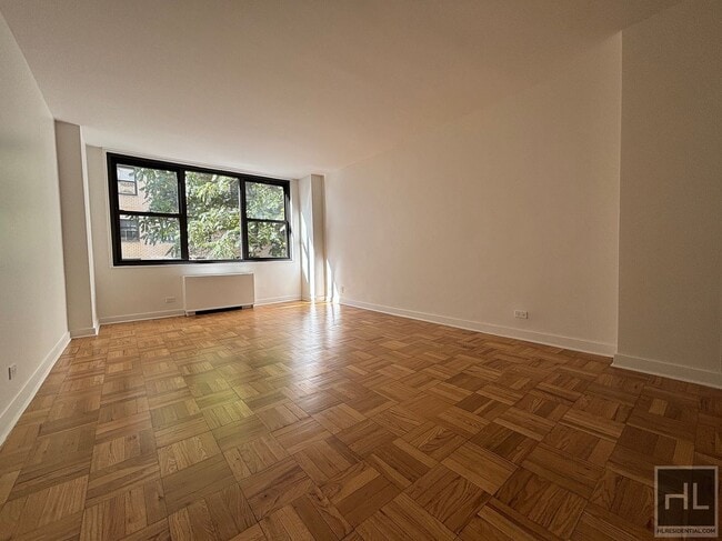 Building Photo - EAST 49 STREET Unit 5B