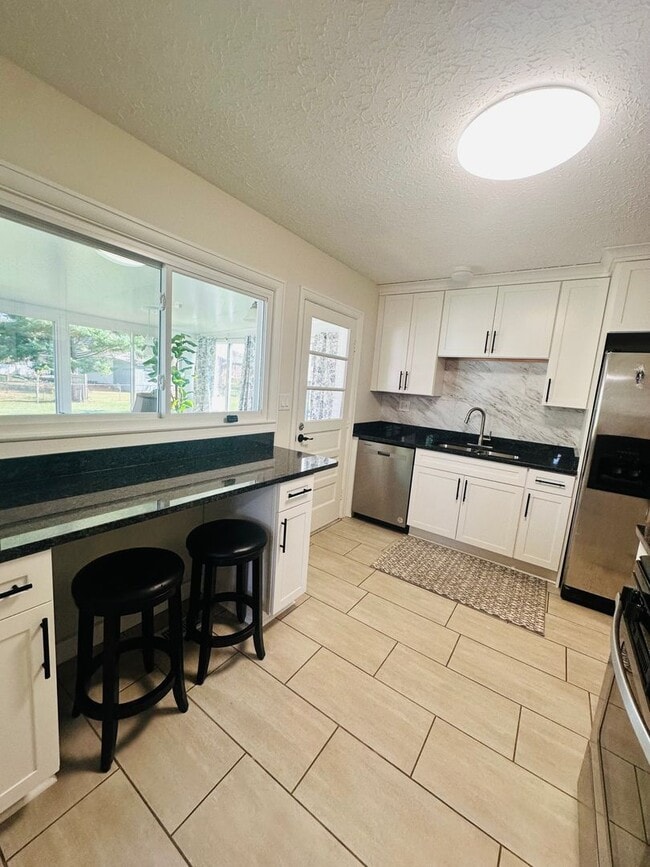 Photo - Charming and Updated Cul-de-Sac Gem with Year-Round Sunroom and Spacious Backyard!