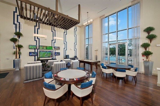 Social Club with TV's, Billiards, and poker tables.