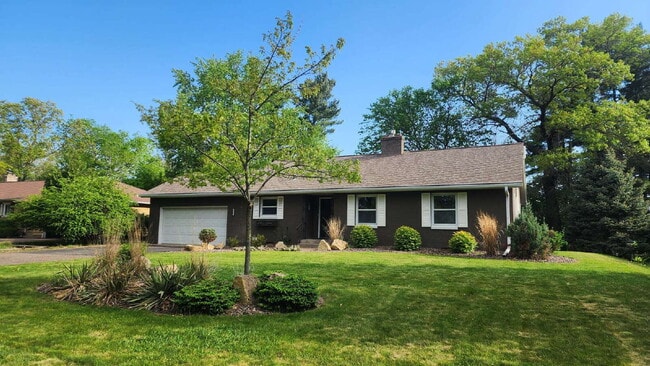 Photo - Spacious 4-Bedroom Home with Bonus Room, 3-Season Porch & Private Backyard