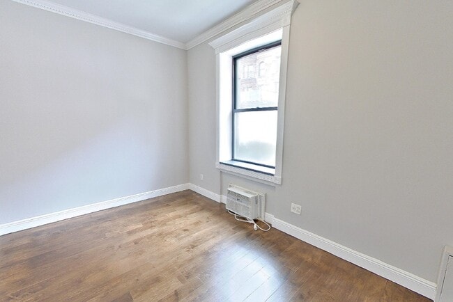 Photo - 209 E 25th St Unidad 1A