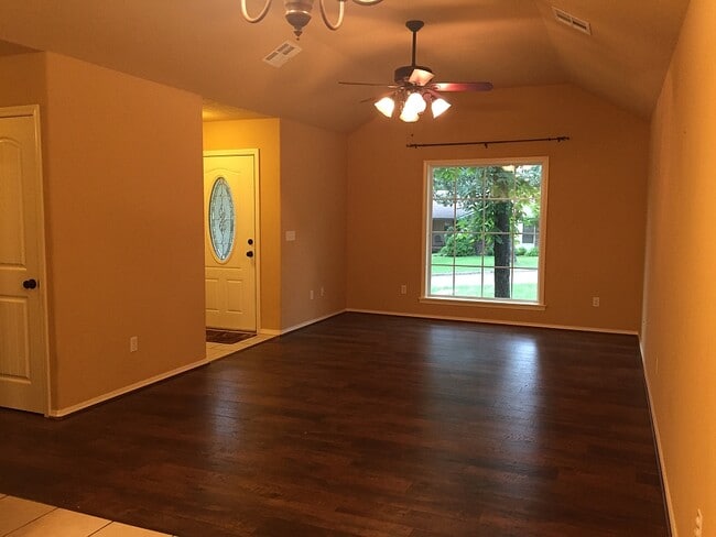 Living room with laminate flooring - 510 Kim St