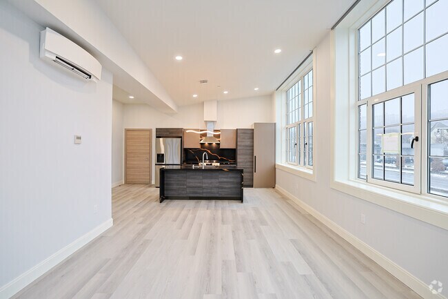 1BR, 1BA - 841SF - Living Room & Kitchen
