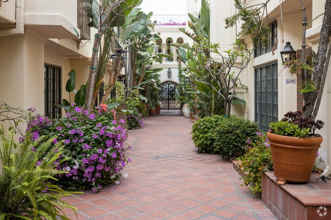 Planters facing complex entrance - ISO - Isola Bella Townhomes