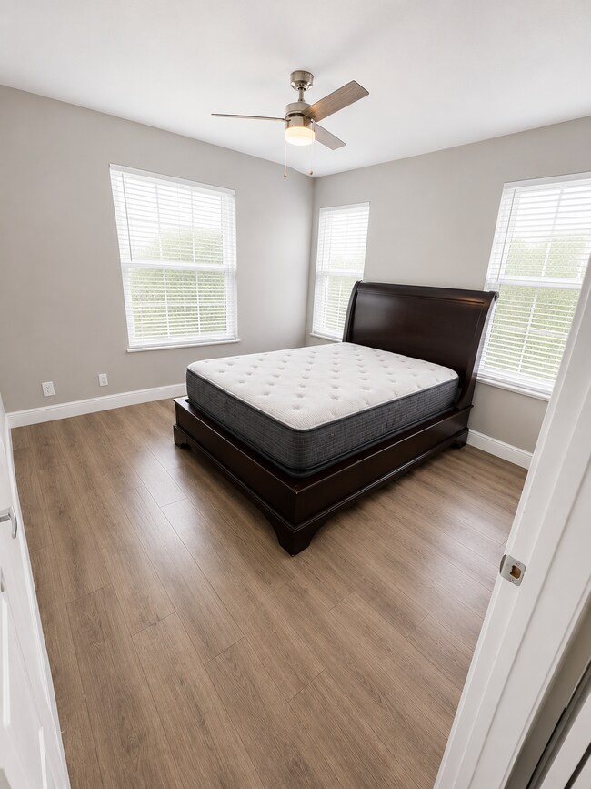 Primary Bedroom with Queen Bed Included - 1818 Meadow Ct