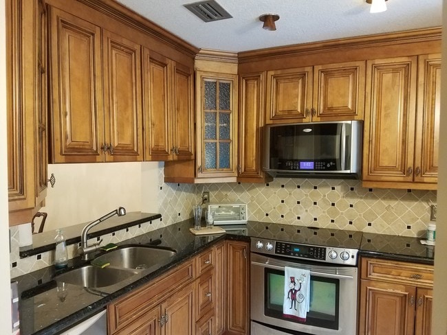 Building Photo - 5200 E Club Cir Unit 202