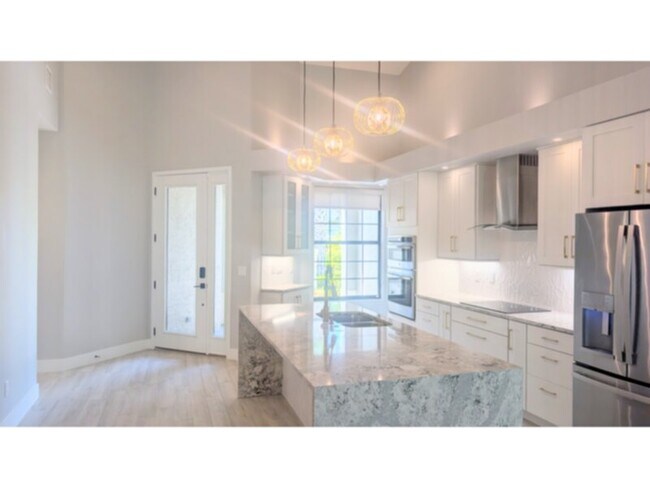 Photo - Elegant, Fully Renovated Townhome in Gated Grand Haven Community!