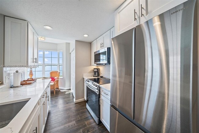 Photo - 5800 NE Island Cove Way Unidad 2207