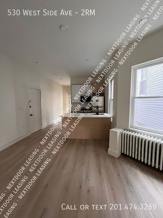 Building Photo - 530 West Side Ave Unit 2RM Rental