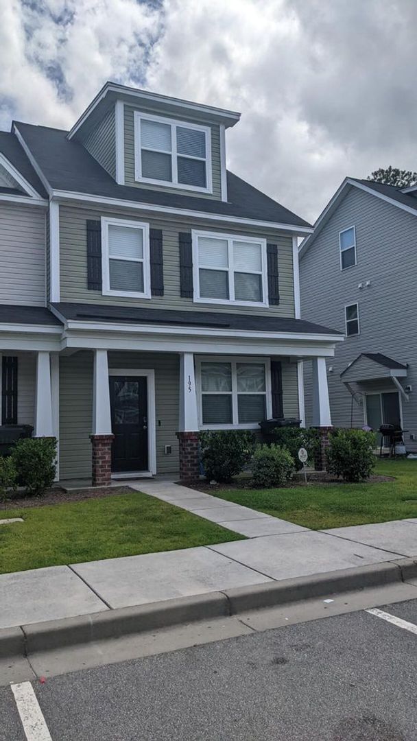 Photo - Sun-Filled 3-Story End-Unit Townhome with Fenced Yard, Storage & Resort-Style Pool