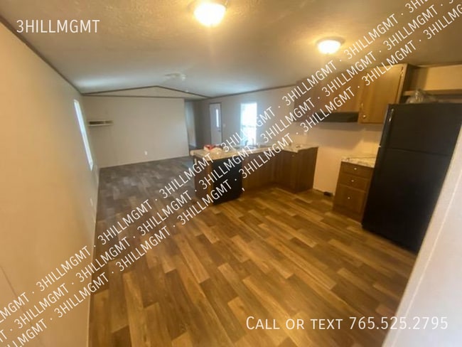 Building Photo - 5600 W Kilgore Ave Unit #25