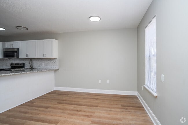 2BR, 1BA - 732SF - Dining / Living Room - Magnolia Trace