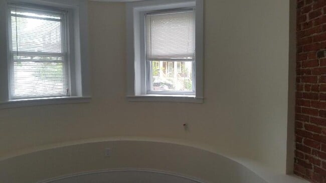 Photo - Nicely updated ground level 1 bed with in-unit laundry near the Green Line.