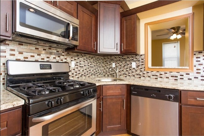 Photo - Spacious 3-Bedroom Home with Central Air, In-Unit Laundry and Patio