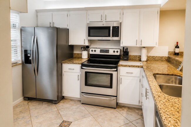 Building Photo - 3540 Whitehall Dr Unit 106