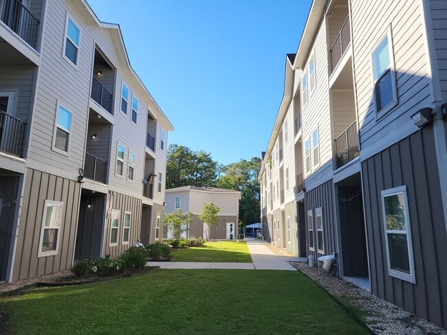 Photo - **Summer Leasing Promotion at Turtle Creek** Unit 1-205