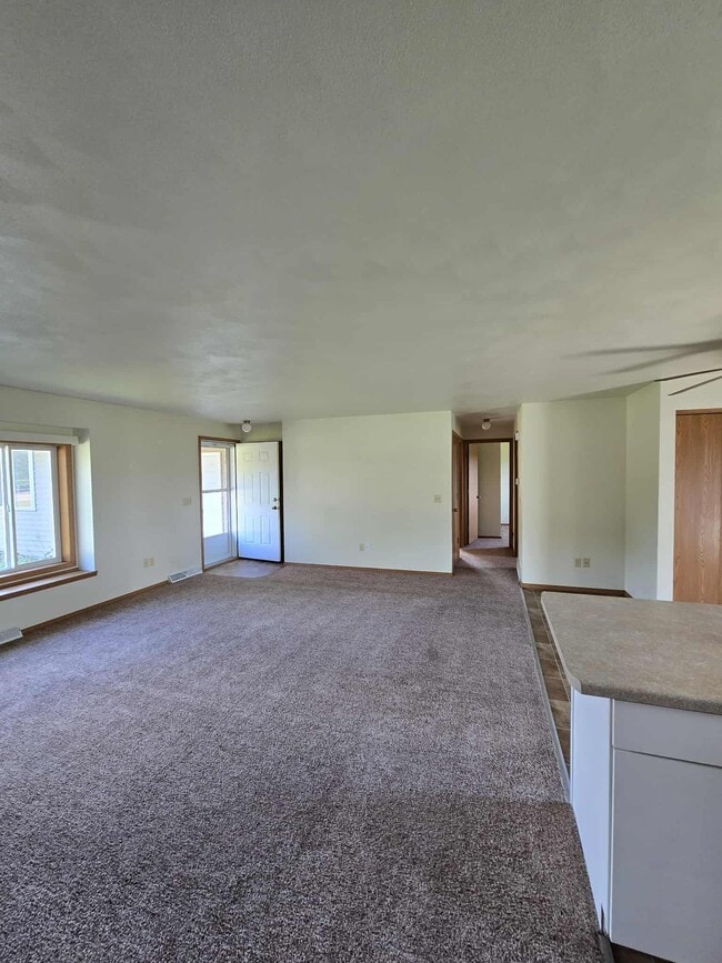 Townhouse (2 bdrm with 2.5 car garage, yard, private basmnt)