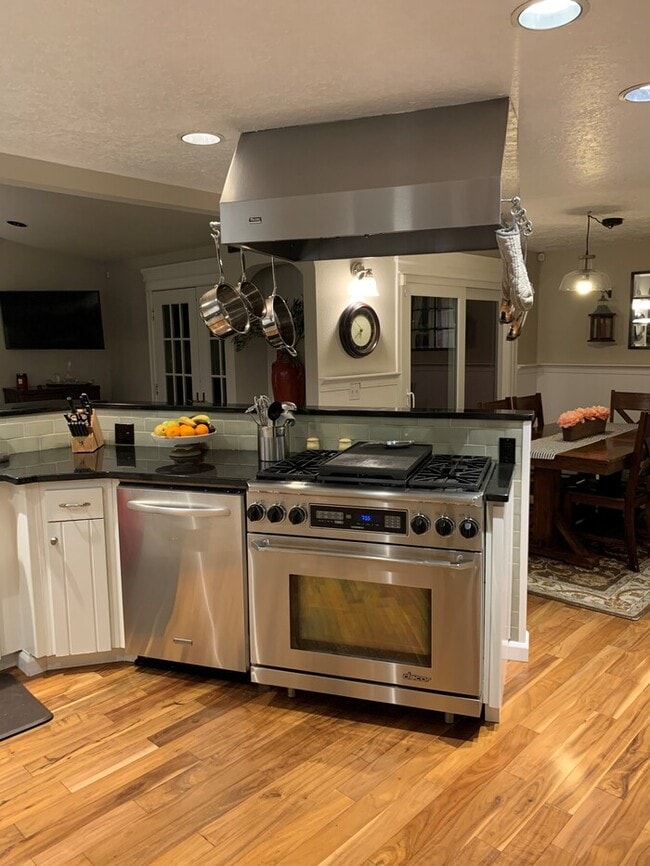 Photo - Spacious 4- Bed Home in Rivergrove Featuring 4-Car Garage, RV Parking, Fenced Yard, Minutes from ...