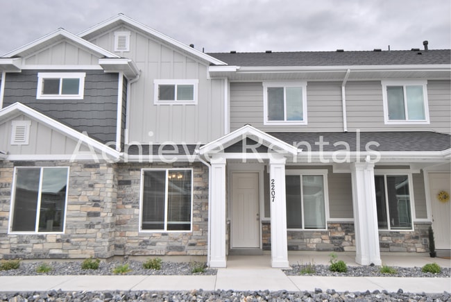 Building Photo - New Built Nibley Townhome | Neighborhood Park & Close to Schools and Town!