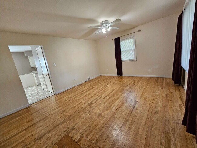 Photo - 3-Bedroom, 2-Bathroom Ranch with Hardwood Flooring, Tiled Kitchen and Finished Basement with a 2 ...